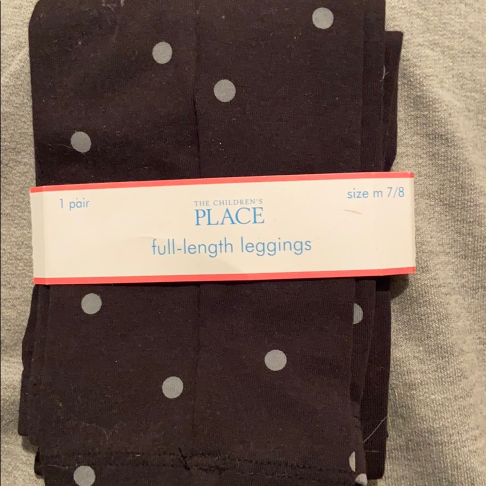 Black polka dot leggings